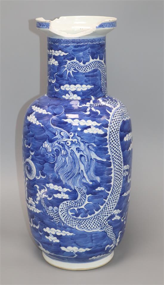 A Chinese Kangxi period blue and white dragon rouleau vase height 46cm (a.f.)